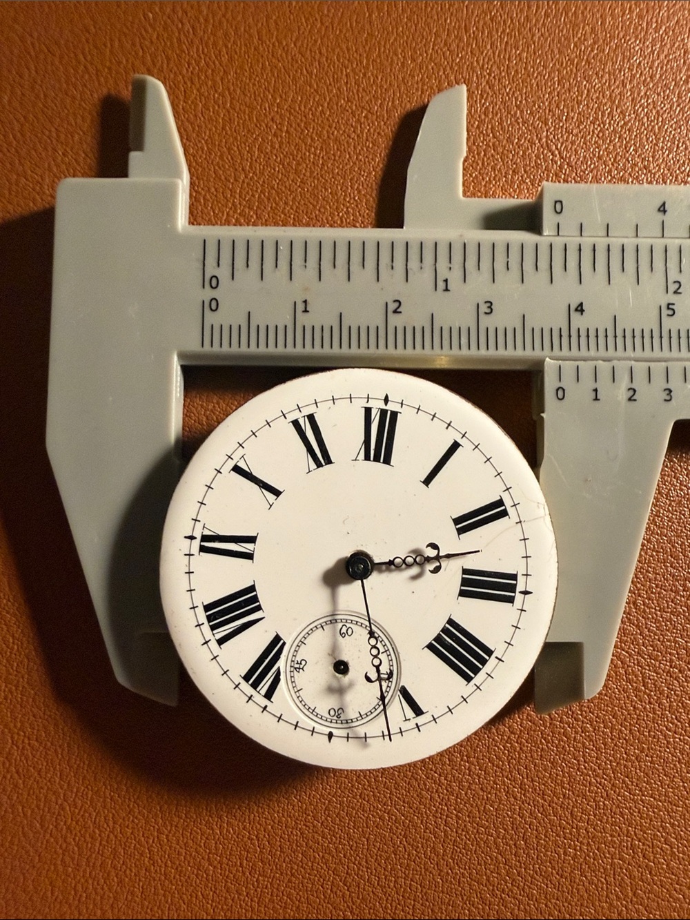 White Roman Numeral Wall Clock Face Accent